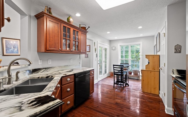 433 Stanford Dr, Flintstone, GA 30725 - kitchen featuring dark wood-style floors, a textured ceiling, light stone counters, a sink, and black appliances
