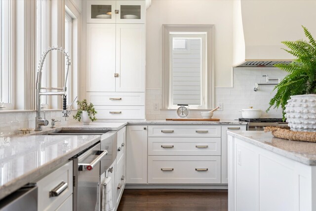 7314 Dug Hill Rd, Bon Aqua, TN 37025 - kitchen featuring white cabinets, backsplash, light stone counters, and stainless steel dishwasher