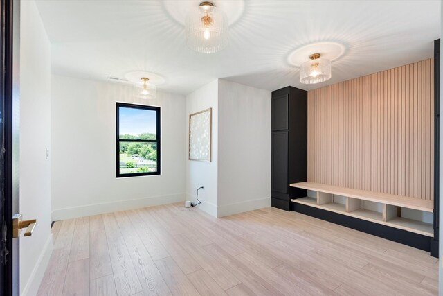 7314 Dug Hill Rd, Bon Aqua, TN 37025 - unfurnished bedroom with light wood-type flooring and baseboards