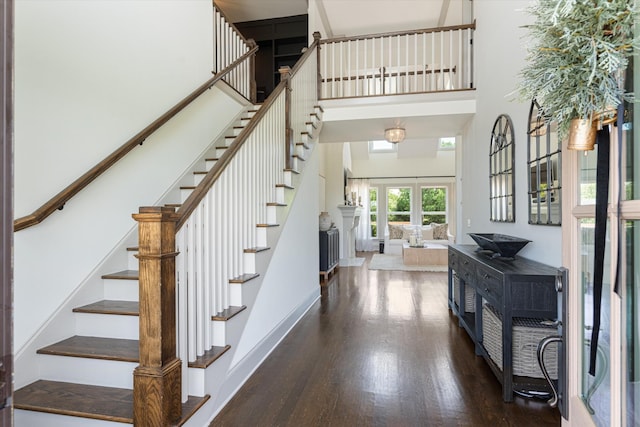7314 Dug Hill Rd, Bon Aqua, TN 37025 - stairway featuring a high ceiling, wood finished floors, and french doors