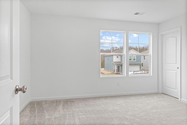 5060 Lawler Ln, Old Hickory, TN 37138 - unfurnished room featuring carpet flooring, baseboards, and visible vents