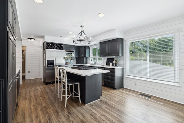 223 Kennett Rd, Old Hickory, TN 37138 - kitchen featuring an inviting chandelier, a kitchen bar, a center island, light countertops, and stainless steel appliances