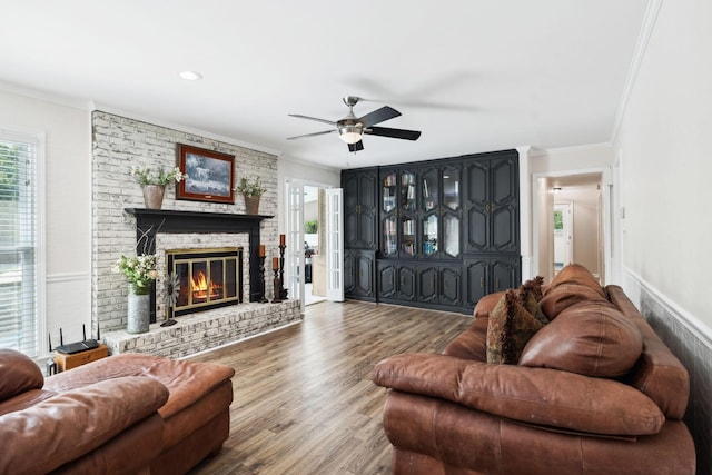 223 Kennett Rd, Old Hickory, TN 37138 - living room featuring crown molding, ceiling fan, a fireplace, and wood finished floors