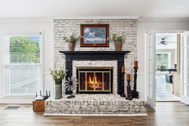 223 Kennett Rd, Old Hickory, TN 37138 - room details with ceiling fan, visible vents, a fireplace, wood finished floors, and ornamental molding
