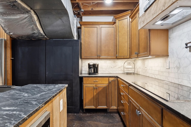 223 Kennett Rd, Old Hickory, TN 37138 - kitchen with under cabinet range hood, brown cabinets, and decorative backsplash