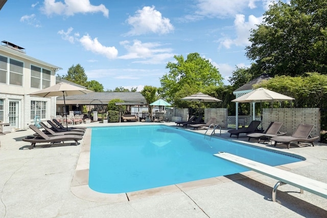 223 Kennett Rd, Old Hickory, TN 37138 - view of swimming pool with a patio, a diving board, fence, and a fenced in pool