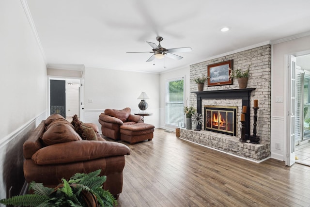 223 Kennett Rd, Old Hickory, TN 37138 - living room with crown molding, ceiling fan, wood finished floors, and a fireplace