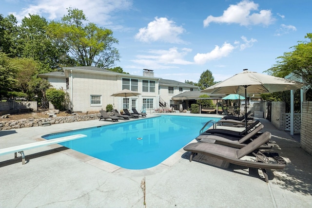 223 Kennett Rd, Old Hickory, TN 37138 - view of pool with a patio, a fenced in pool, fence, and a diving board