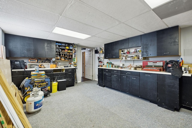 223 Kennett Rd, Old Hickory, TN 37138 - interior space featuring dark cabinets, open shelves, a drop ceiling, and light carpet