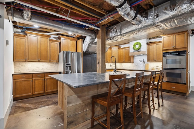 223 Kennett Rd, Old Hickory, TN 37138 - kitchen featuring finished concrete flooring, tasteful backsplash, stainless steel appliances, and a sink