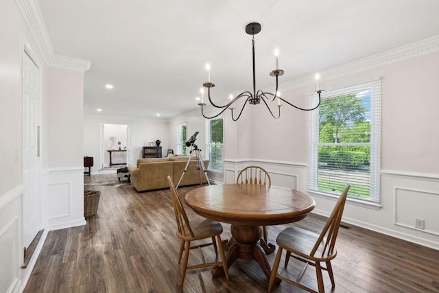 223 Kennett Rd, Old Hickory, TN 37138 - dining room featuring a chandelier, wainscoting, a healthy amount of sunlight, and a decorative wall