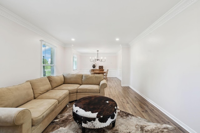 223 Kennett Rd, Old Hickory, TN 37138 - living room with crown molding, baseboards, a chandelier, and wood finished floors
