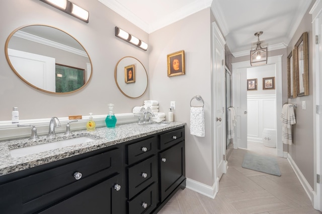full bath featuring crown molding, baseboards, a shower, and vanity