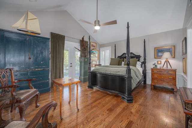 bedroom featuring visible vents, wood finished floors, high vaulted ceiling, and access to exterior