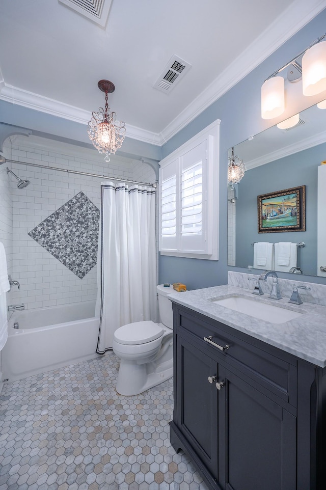 bathroom featuring vanity, ornamental molding, toilet, and visible vents