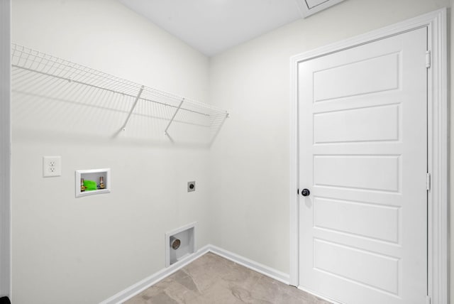 laundry area with laundry area, hookup for a washing machine, baseboards, and hookup for an electric dryer