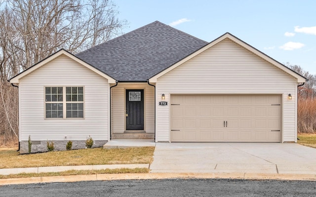 ranch-style house featuring an attached garage, driveway, and roof with shingles