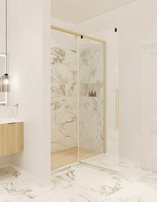 bathroom featuring a marble finish shower, vanity, and marble finish floor