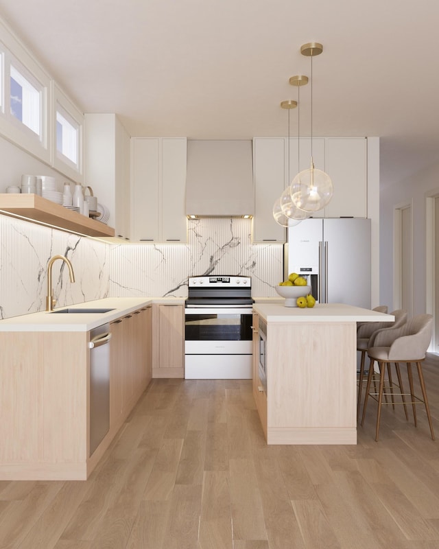 kitchen with light brown cabinetry, custom range hood, a sink, light wood-style flooring, and stainless steel appliances