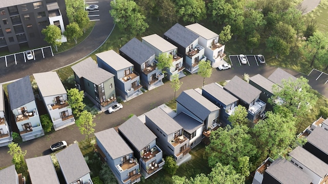 birds eye view of property with a residential view