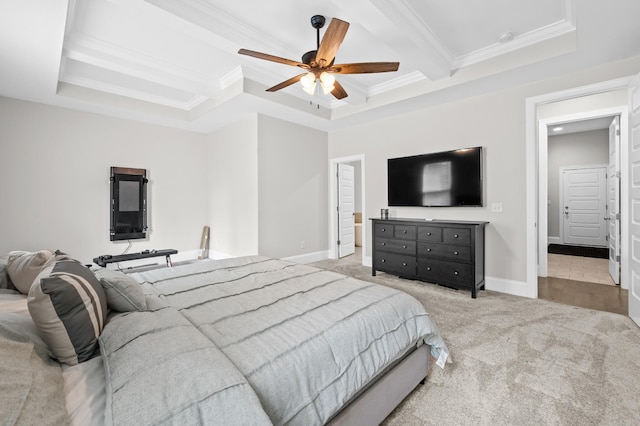 carpeted bedroom with a tray ceiling, a ceiling fan, beamed ceiling, ornamental molding, and coffered ceiling