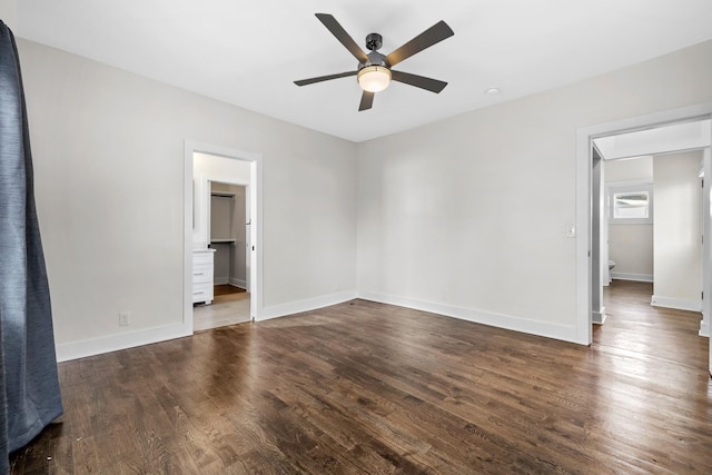 unfurnished bedroom featuring a ceiling fan, baseboards, and wood finished floors
