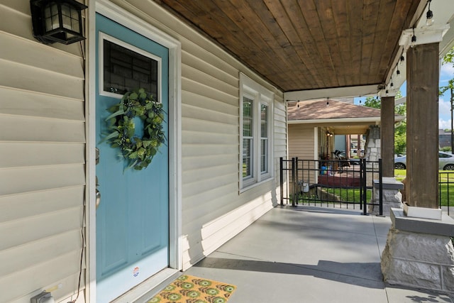 entrance to property with covered porch