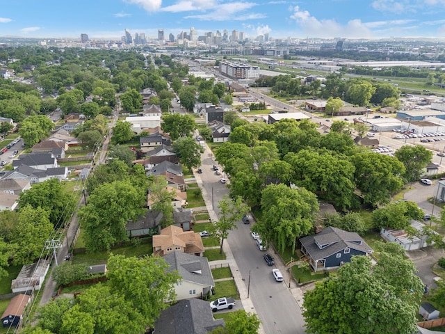 birds eye view of property featuring a city view