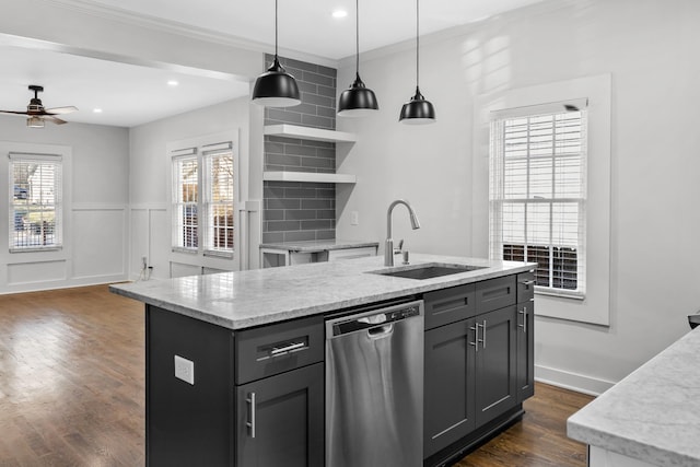 kitchen with open shelves, an island with sink, ceiling fan, a sink, and dishwasher