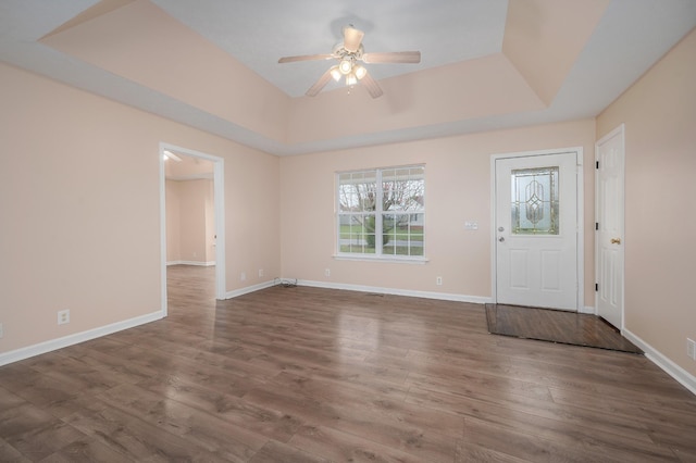 143 Willdon Dr, Portland, TN 37148 - foyer entrance featuring a raised ceiling, ceiling fan, baseboards, and wood finished floors