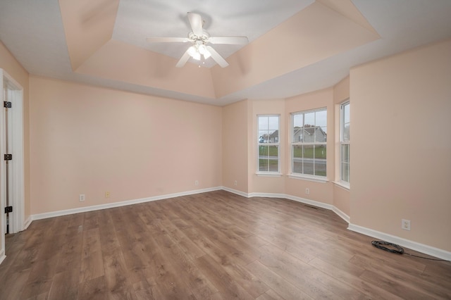 143 Willdon Dr, Portland, TN 37148 - unfurnished room featuring baseboards, a tray ceiling, ceiling fan, and wood finished floors