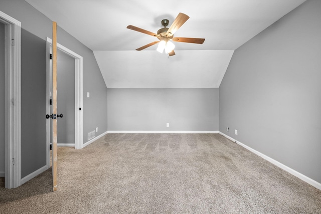 bonus room featuring baseboards, a ceiling fan, carpet flooring, and vaulted ceiling