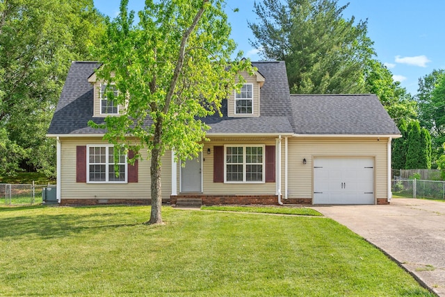 cape cod house with fence, roof with shingles, an attached garage, a front lawn, and concrete driveway