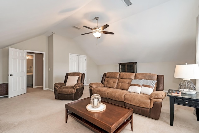 living room with a ceiling fan, visible vents, light carpet, and lofted ceiling