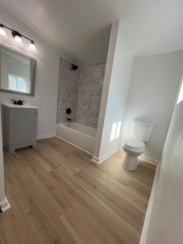 419 Hawkins Ave, Murfreesboro, TN 37130 - full bathroom featuring tub / shower combination, baseboards, wood finished floors, and toilet