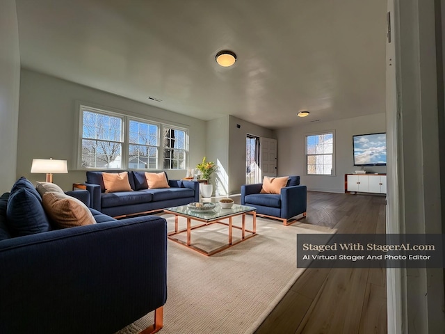 419 Hawkins Ave, Murfreesboro, TN 37130 - living area with baseboards, visible vents, and wood finished floors
