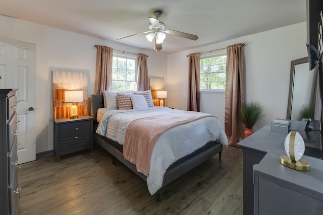 bedroom with ceiling fan and wood finished floors