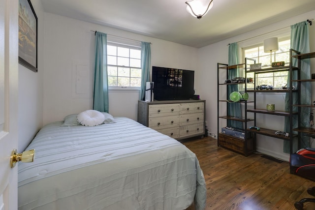 bedroom featuring wood finished floors