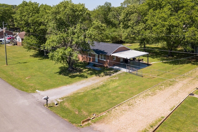 drone / aerial view with a view of trees