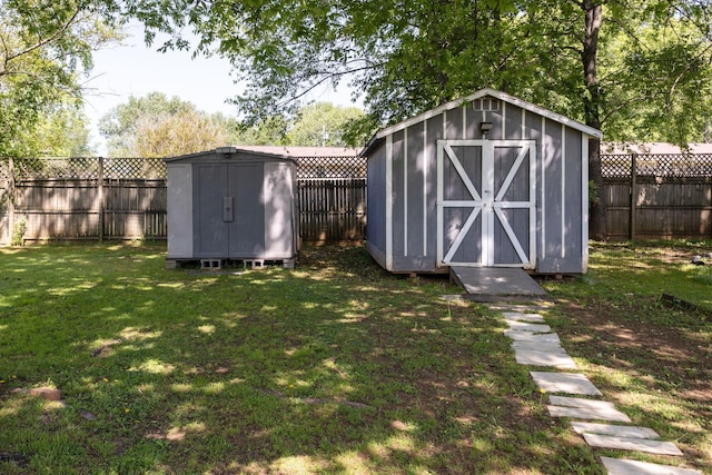 view of shed featuring a fenced backyard