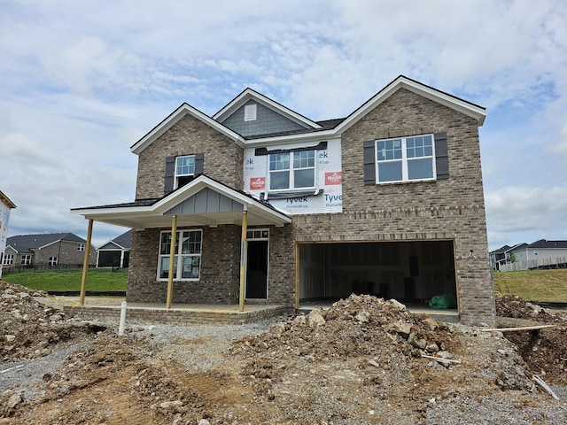 1126 Aster Pl, Mount Juliet, TN 37122 - view of front of property featuring brick siding, a porch, and an attached garage