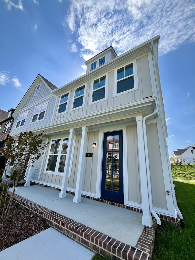 view of front of property with covered porch and board and batten siding