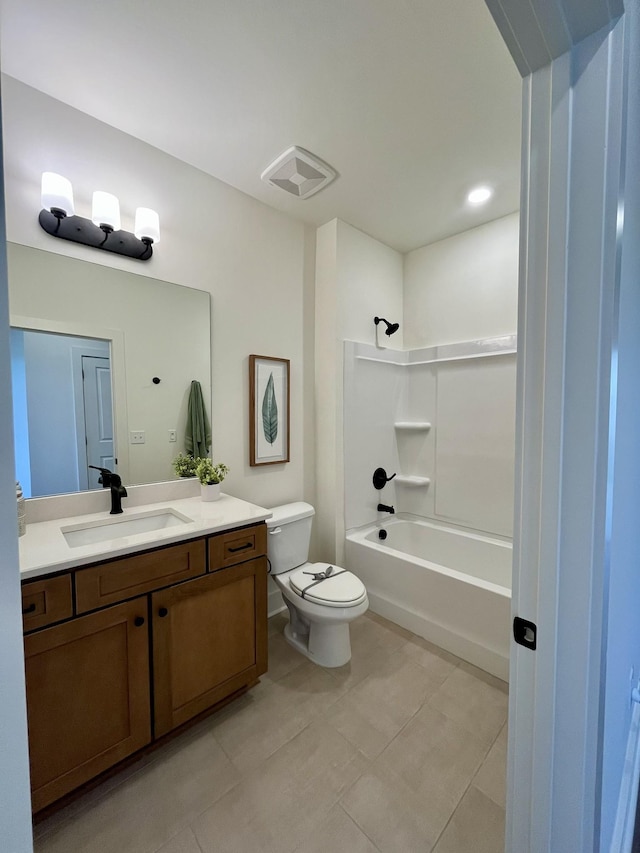 full bath with vanity, tile patterned floors, toilet, and shower / tub combination