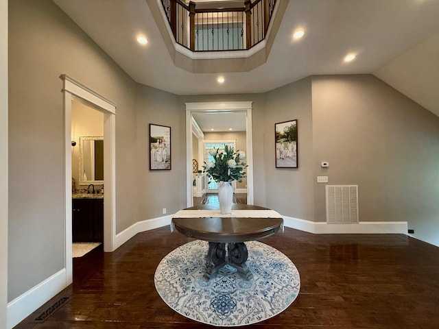 foyer with recessed lighting, baseboards, visible vents, and wood finished floors