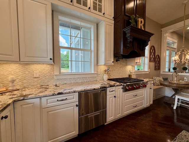 kitchen featuring decorative backsplash, white cabinets, stainless steel appliances, and dark wood-style floors