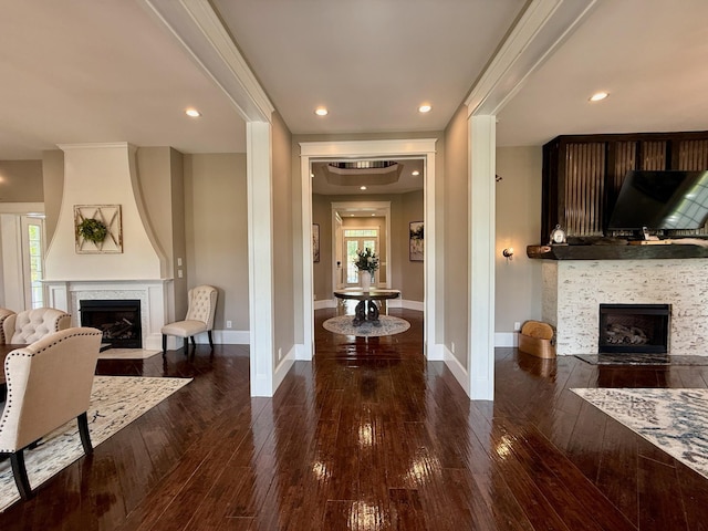 living room with baseboards, a fireplace, recessed lighting, and hardwood / wood-style floors