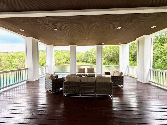 deck with an outdoor hangout area