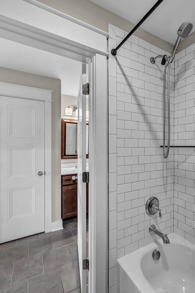 bathroom with vanity, tile patterned floors, and bathtub / shower combination