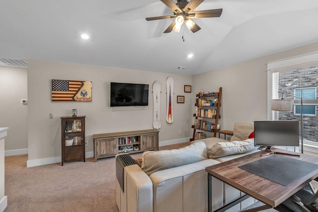 living room with light carpet, a ceiling fan, baseboards, recessed lighting, and vaulted ceiling