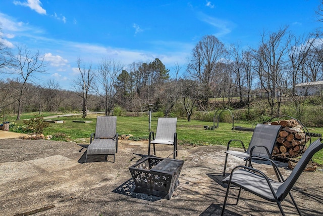 2075 Buttrey Rd, Bon Aqua, TN 37025 - view of patio / terrace featuring an outdoor fire pit